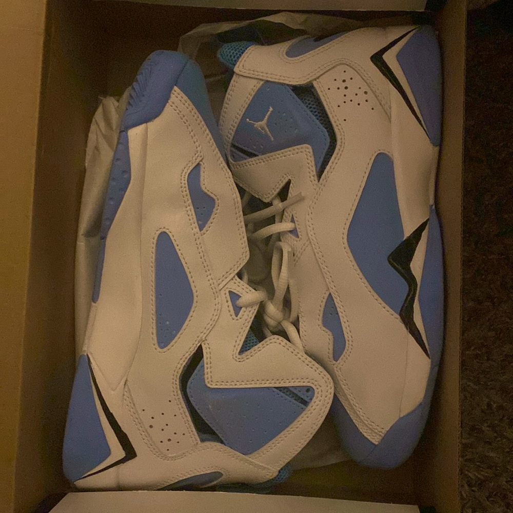 Selling kids shoes size six blue and white only 65$
